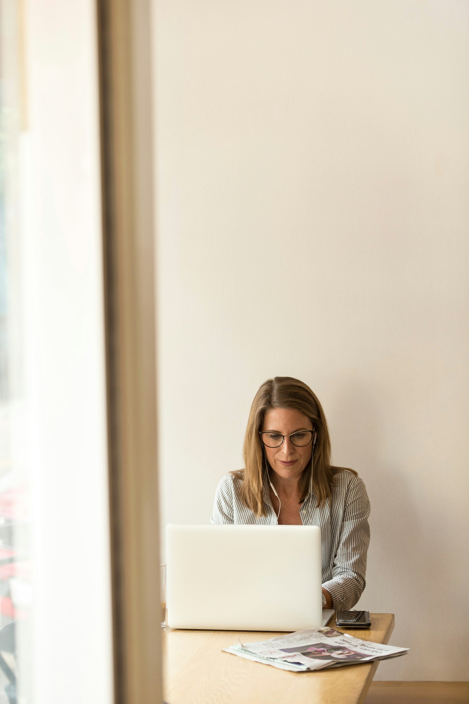 Professional analyzing information on a laptop